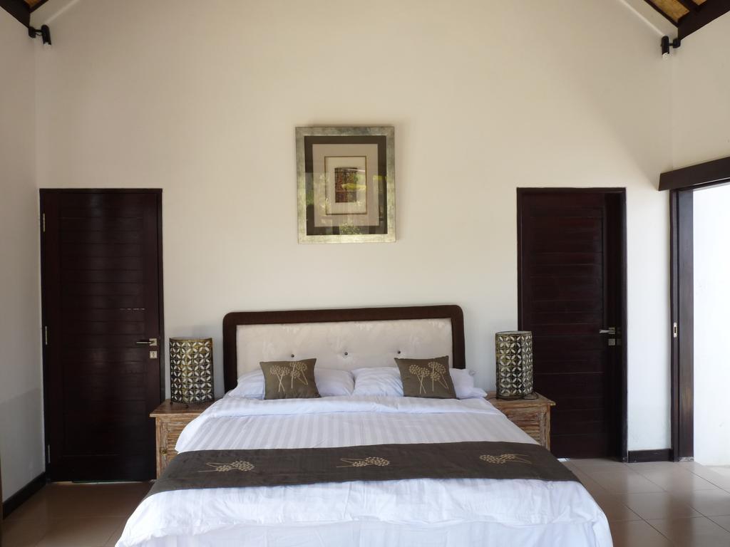 Taman Dewi Sri Villa Et Bungalow Pemuteran Szoba fotó