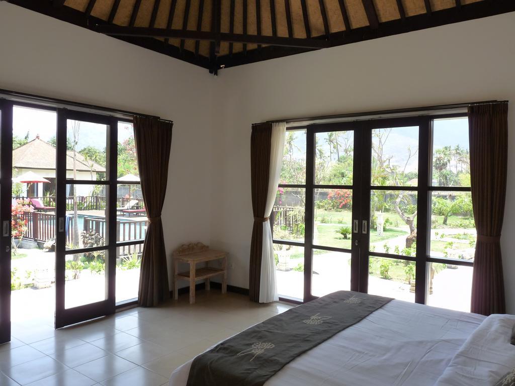 Taman Dewi Sri Villa Et Bungalow Pemuteran Szoba fotó
